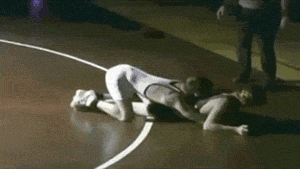 Crazy+fan+attacks+wrestler+during+a+match