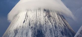 Lenticular+clouds+over+mountain