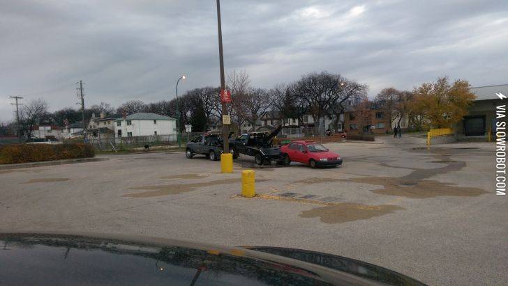 A+tow+truck+towing+a+tow+truck+towing+a+car.