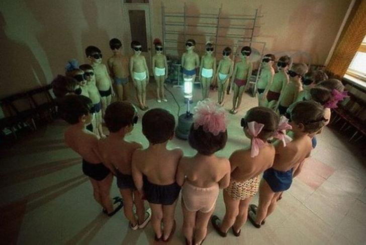 School+kids+recieving+their+vitamin+D+in+Soviet+Russia.