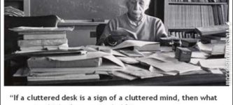 A+cluttered+desk.