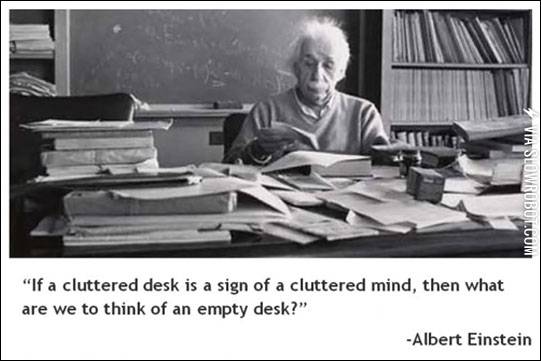 A+cluttered+desk.