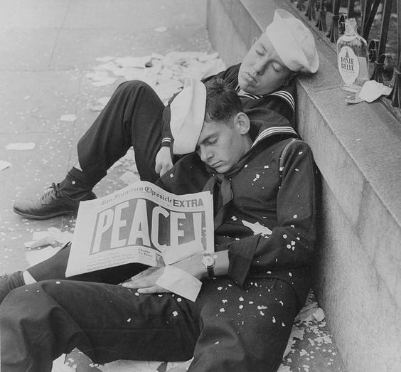 Two+sailors+passed+out+on+the+street+from+celebrating+the+end+of+WWII+1945