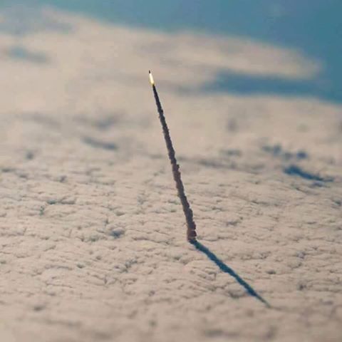 Photograph+of+a+space+shuttle+leaving+our+atmosphere+taken+by+NASA