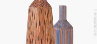 These+vases+are+made+from+pencils+glued+together.