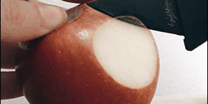 Cutting+a+thin+apple+slice