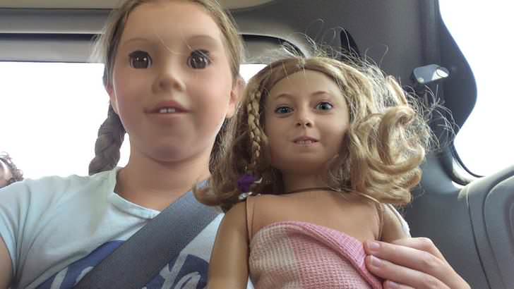 She+face+swapped+with+her+doll.