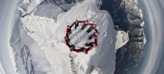 Drone+photo+of+nine+climbers+atop+the+summit+of+the+Jungfrau+in+Switzerland