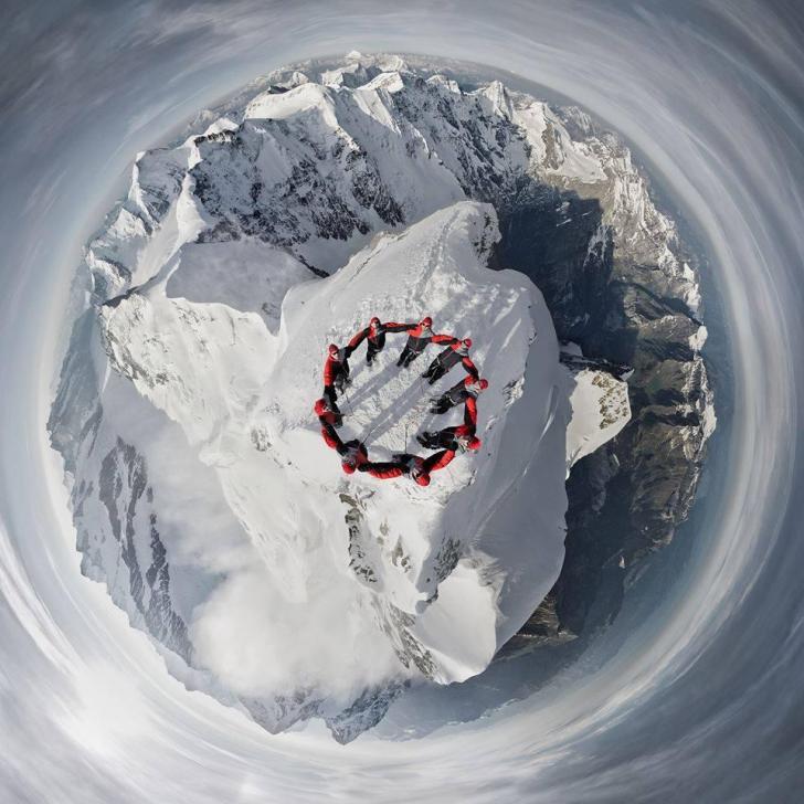 Drone+photo+of+nine+climbers+atop+the+summit+of+the+Jungfrau+in+Switzerland