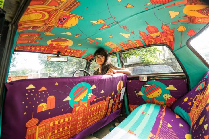 The+vibrant+interior+of+a+taxi+in+India