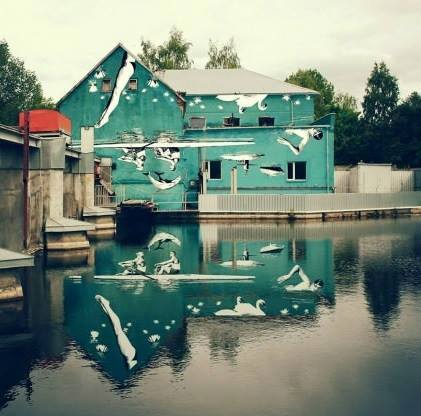 This+mural+was+purposely+painted+upside+down+to+reflect+off+of+the+water.