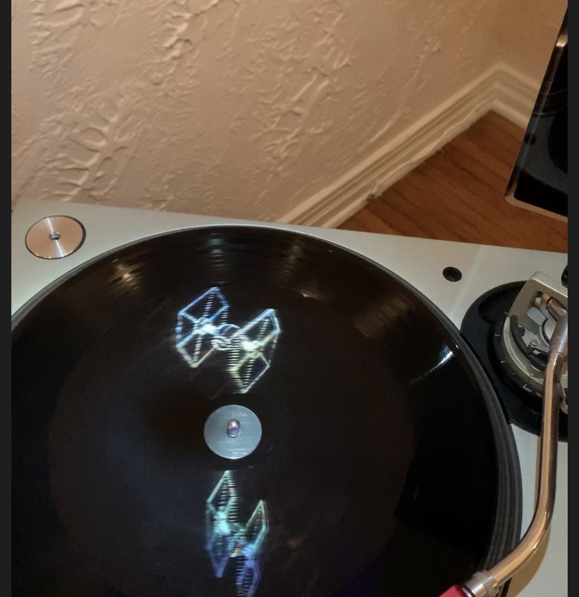 This+record+has+a+3D+hologram+of+a+Tie+fighter+on+it