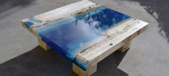 Table+made+of+resin+and+travertine+marble.