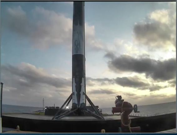 SpaceX+just+landed+their+re-used+Falcon+9+rocket+on+a+ship+in+the+ocean.