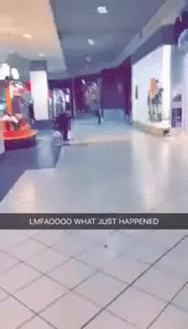 Woman+stops+a+man+running+from+mall+security