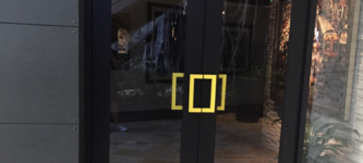 National+Geographic+offices+use+their+logo+as+door+handles.