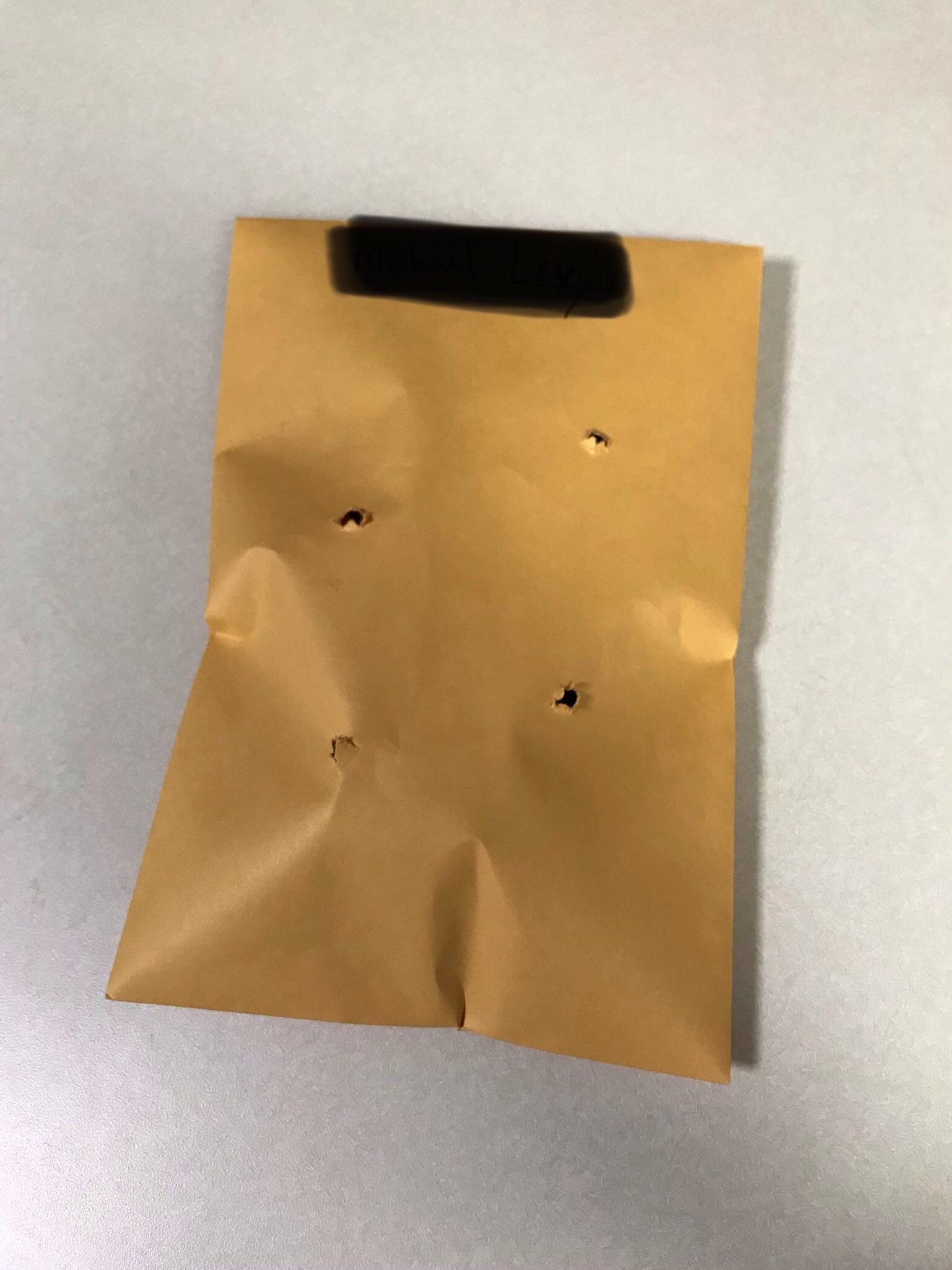 The+IT+guy+at+work+sent+me+a+new+mouse+and+poked+air+holes+in+the+envelope.