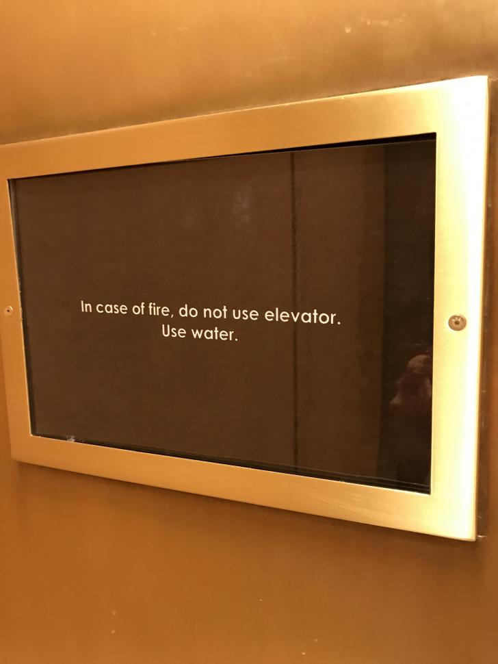 Sign+inside+an+elevator.