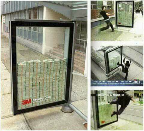 An+advertisement+in+a+street+about+bulletproof+glass+behind+it+%24+3+million+for+those+who+can+break+the+glass+and+get+it+..+Creative+advertisement