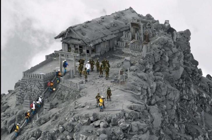 A+temple+covered+in+ashes+after+a+volcano+eruption%2C+China