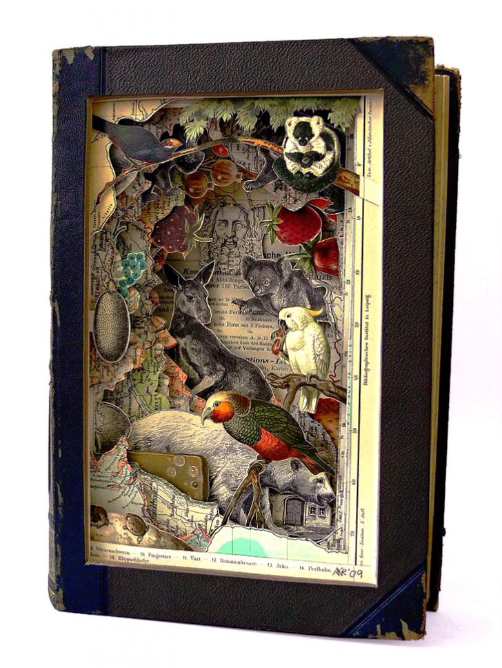 Artist+selectively+cuts+individual+Book+Pages+to+retain+the+illustrations+and+create+a+Diorama