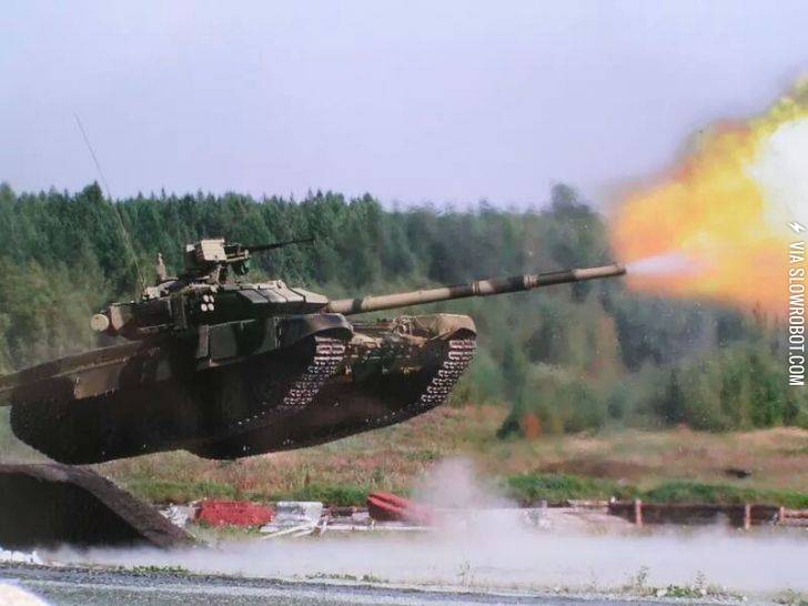 A+tank+firing+in+mid+air.