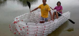 guy+makes+a+boat.+from+soda+bottles.