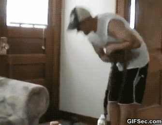 Playing+with+a+pet+raccoon.