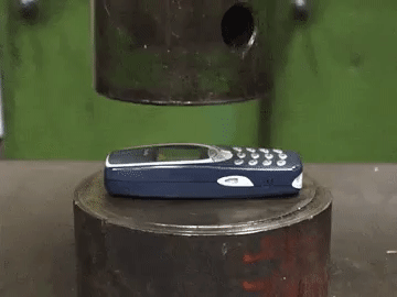 Crushing+a+Nokia+3310+with+a+hydraulic+press