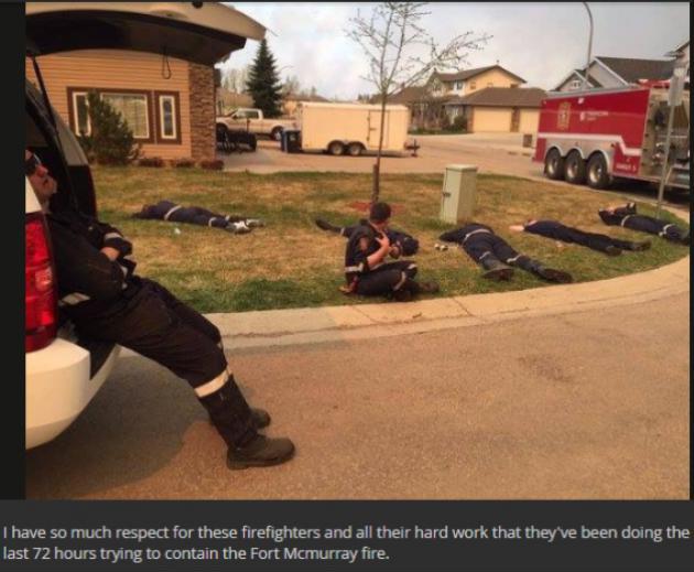 Firefighters+who+worked+tirelessly+through+the+night+finally+get+some+much+needed+rest+anywhere+they+can.