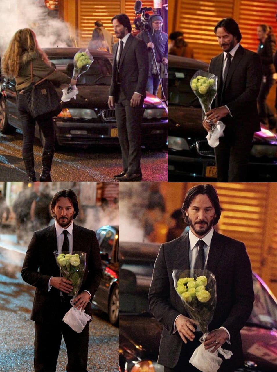 Keanu+Reeves+getting+flowers+from+a+fan