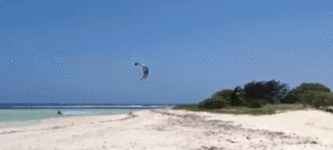 Kite+surfer+jumps+over+island.