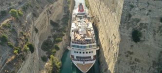 A+cruise+ship+passing+through+canal+of+Corinth
