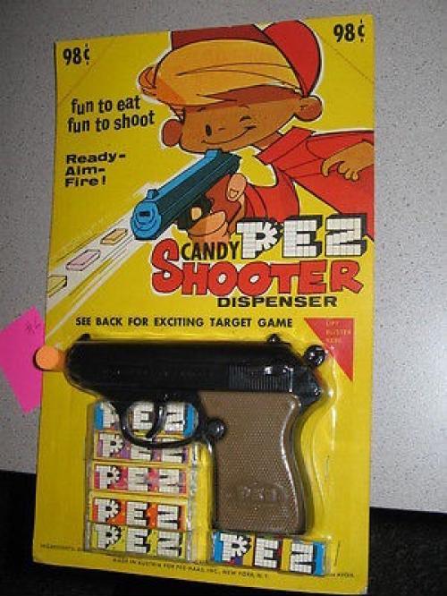 WTF+PEZ%3F%21+Pez+made+a+dispenser+where+you+had+to+put+the+gun+in+your+mouth+and+pull+the+trigger.