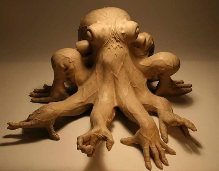 Octopus+sculpture+with+hands+on+it%26%238217%3Bs+tentacles