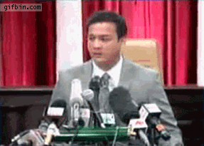 LOL+expression+on+falling+microphone