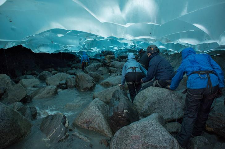 Hiking+under+a+glacier.