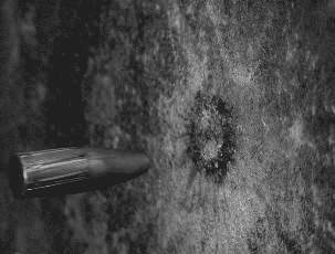 A+bullet+hits+a+wall.