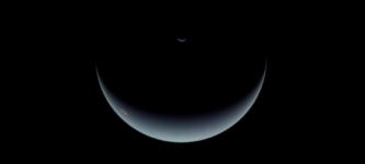 Neptune+and+Triton+taken+by+Voyager+in+1979.