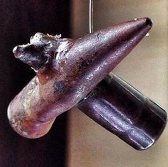 Two+rifle+bullets+that+collided+in+midair+and+fused+together+during+WW1.