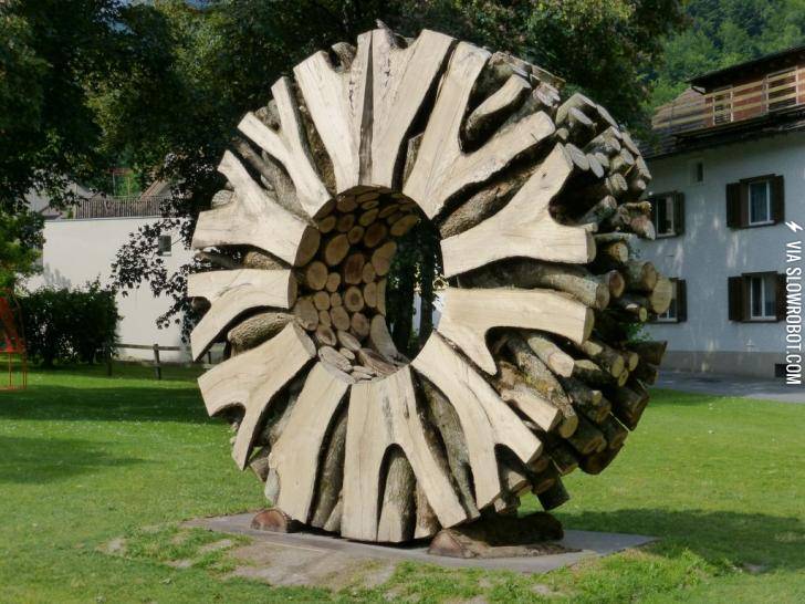 Wood+wheel+sculpture