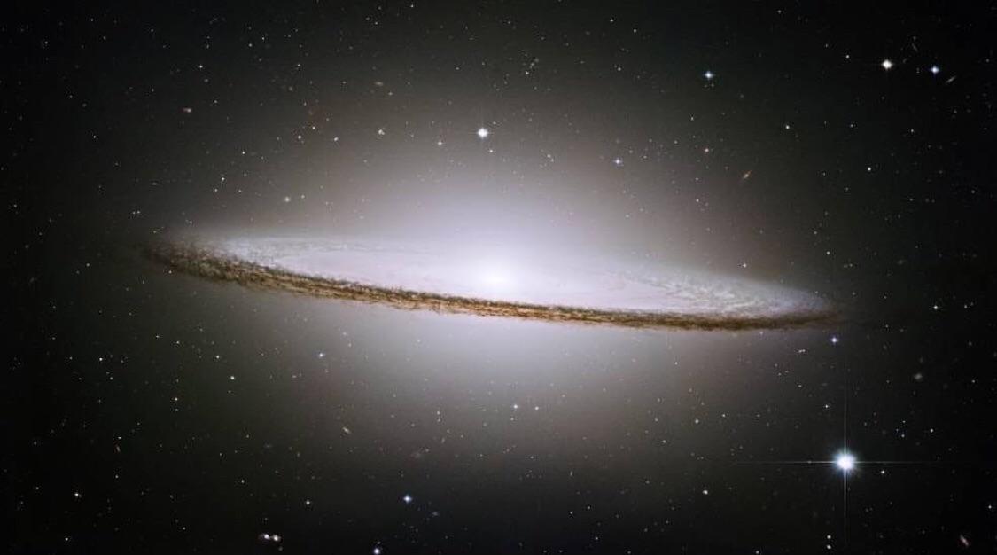 The+Spiral+Galaxy+M104%2C+also+named+Sombrero+Galaxy+located+28+million+light-years+from+Earth%2C+taken+by+NASA+Hubble.