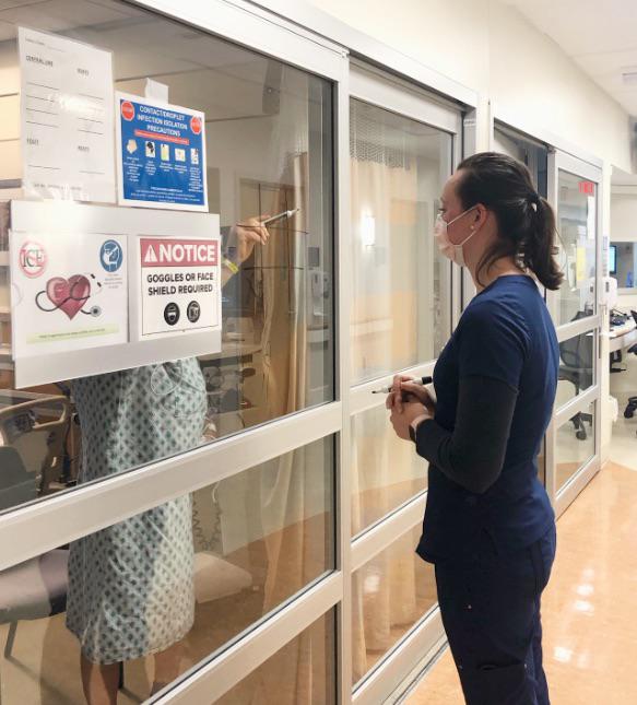 Nurse+playing+Tic-Tac-Toe+with+a+COVID-19+Patient